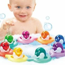 TOMY Do-Re-Mi Dolfijnen - Badspeelgoed -Aanbiedingen badspeelgoed Winkel 550x452 1